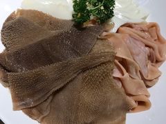-明何记涮牛肚(品牌首店隋唐植物园南门古城路店)