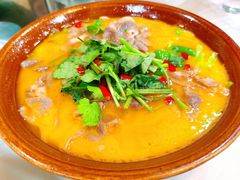 酸汤肥牛-柏合黄记豆腐皮饭店