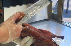 Sliced Roast Duck with Sauce Pancakes and Cucumber