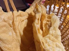 -老牌坊云南鱼豆花火锅(哈西万达店)