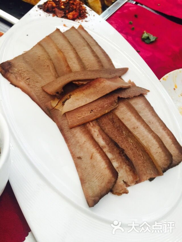 南山南土司烤牛头图片 - 第6张