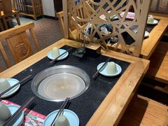 -明何记涮牛肚(品牌首店隋唐植物园南门古城路店)