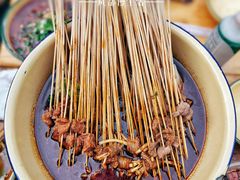 -拈签一笑黄牛肉辣卤串串