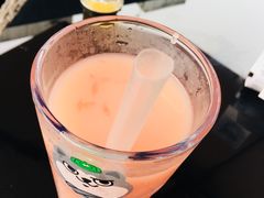满杯红柚可尔必思-野萃山·潮汕厚果汁(十亩地店)