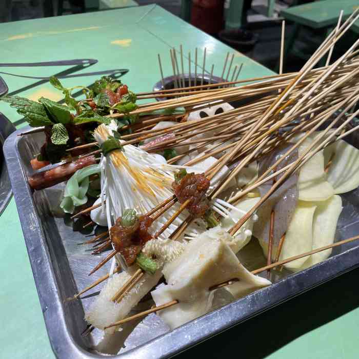 向签看串串香(南湖逸家店"老爸和朋友出去钓鱼回来准备吃串串在家