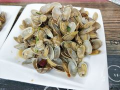 辣炒蛤蜊-1910老鲁味海鲜·戳子肉·青岛菜(金沙滩店)