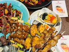 -曼听小寨海鲜烧烤·大连辣炒大王(盖州街店)