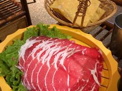 -老牌坊云南鱼豆花火锅(哈西万达店)