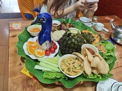 -沐毫傣泐云南菜孔雀宴•手抓饭傣味烧烤(曼听公园店)