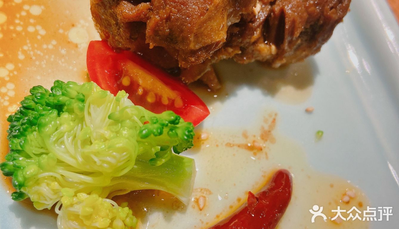 在大众点评上是排名第一的。那个白色肉片9元/片
