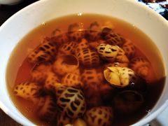 古越陈酿煮花螺-杭州西子湖四季酒店·金沙厅