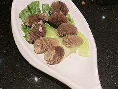 -明何记涮牛肚(品牌首店隋唐植物园南门古城路店)