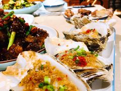 烤生蚝-金太阳海鲜烧烤·本地人餐厅(星海公园店)