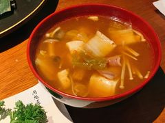 辣白菜海鲜豆腐汤-肉魁屋·烧肉·烧鸟·酒场(高新店)