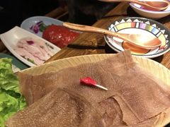 -老牌坊云南鱼豆花火锅(哈西万达店)