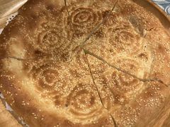 馕坑芝麻馕-巴扎美食·新疆菜·西域歌舞表演餐厅(新疆大厦店)