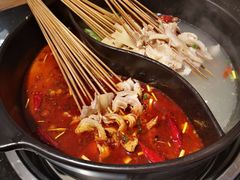 -明何记涮牛肚(品牌首店隋唐植物园南门古城路店)