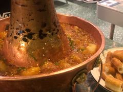 土司铜锅油焖鸡-浩海火烧云傣家菜(京广店)