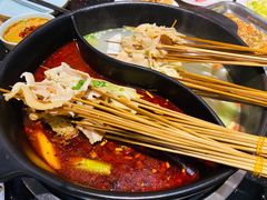 -明何记涮牛肚(品牌首店隋唐植物园南门古城路店)