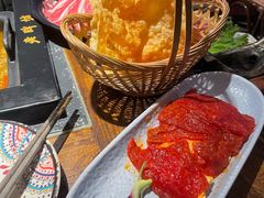 -老牌坊云南鱼豆花火锅(哈西万达店)
