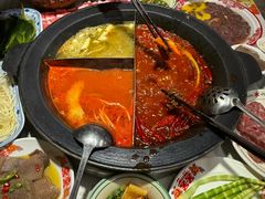 -明何记涮牛肚(品牌首店隋唐植物园南门古城路店)