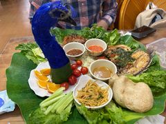 -沐毫傣泐云南菜孔雀宴•手抓饭傣味烧烤(曼听公园店)