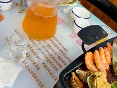 纯生扎啤-桔子海鲜烧烤大排档(金沙滩店)