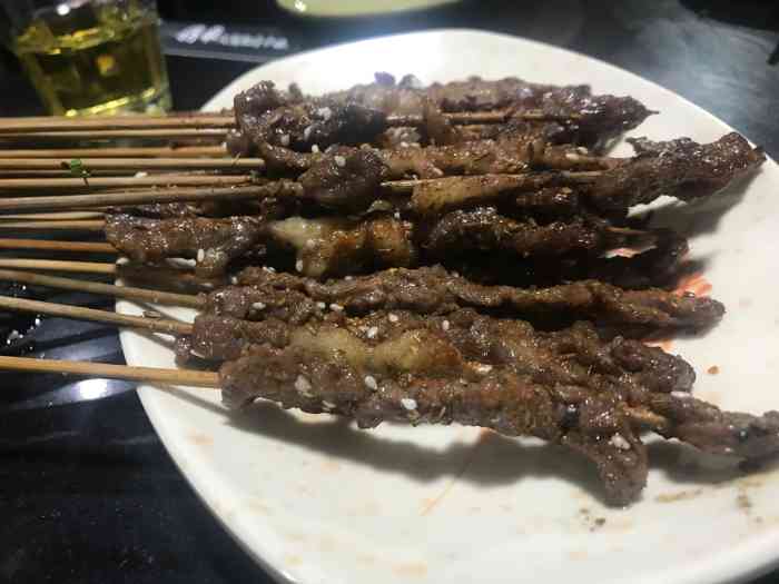 光头佬烧烤-"拔草搜索附近烧烤看到网友的评论导航过来.