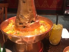 土司铜锅油焖鸡-浩海火烧云傣家菜(京广店)