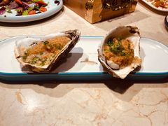蒜蓉烤生蚝-金太阳海鲜烧烤·本地人餐厅(星海公园店)