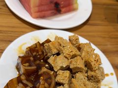 -明何记涮牛肚(品牌首店隋唐植物园南门古城路店)
