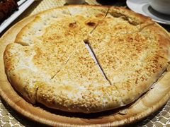 馕坑芝麻馕-巴扎美食·新疆菜·西域歌舞表演餐厅(新疆大厦店)