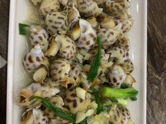 葱姜炒花螺-贞姨美食·老字号海鲜大排档
