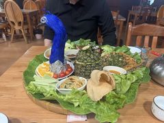 -沐毫傣泐云南菜孔雀宴•手抓饭傣味烧烤(曼听公园店)