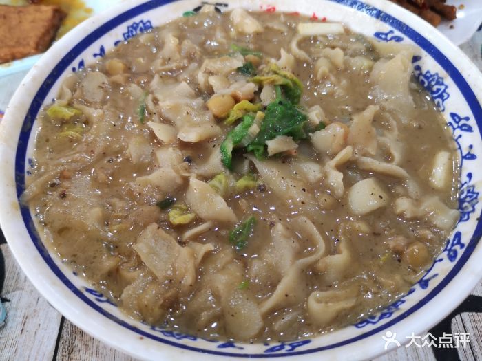 小谭刀削面图片