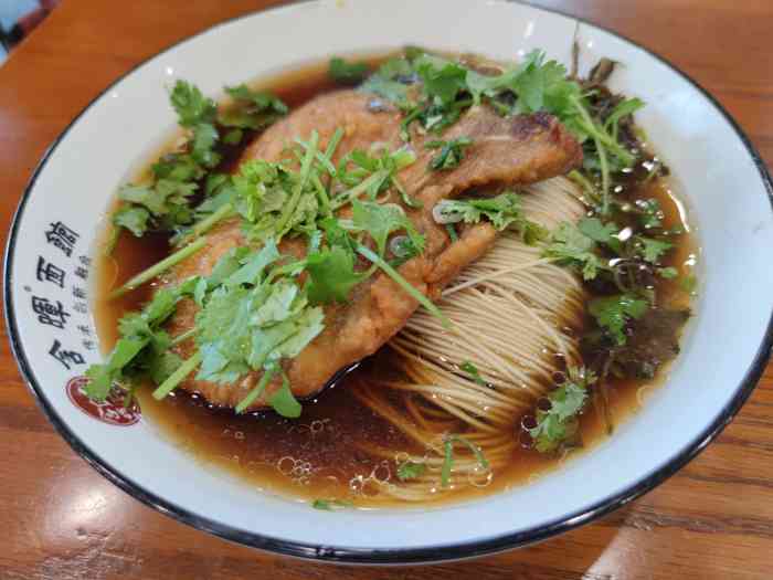 含晖面馆(珠江路店)-"常熟面的特点就是现炒浇头,可以单浇,也可.