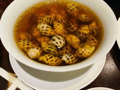 古越陈酿煮花螺-杭州西子湖四季酒店·金沙厅