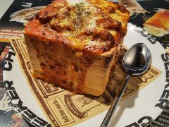 澳门厚切猪扒焗饭-開籠雀冰室(同和金铂店)