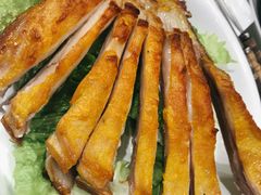 馕坑果木烤羊排-巴扎美食·新疆菜·西域歌舞表演餐厅(新疆大厦店)