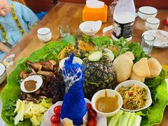 -沐毫傣泐云南菜孔雀宴•手抓饭傣味烧烤(曼听公园店)