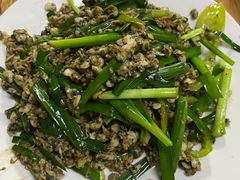 炒螺肉-海口滨海新村143号海南老字号炒菜店