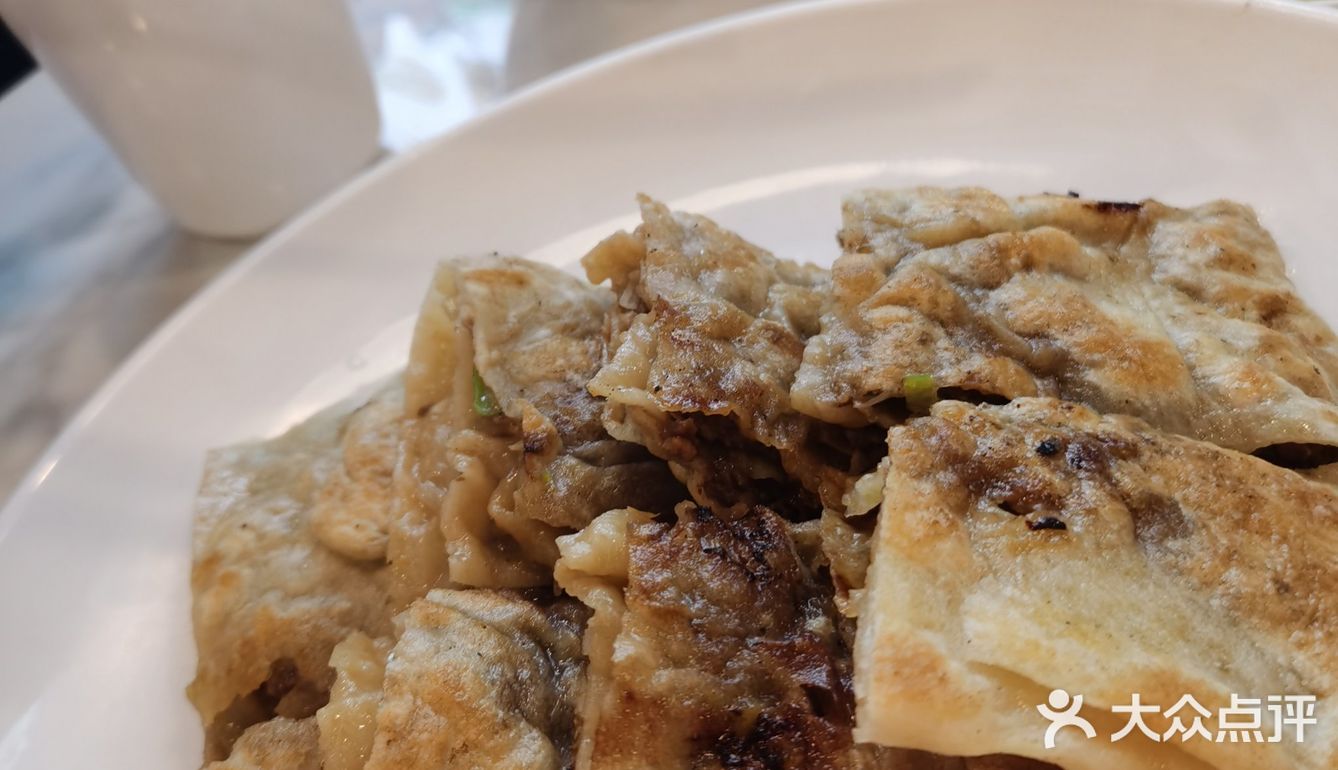 他家的糖油饼太太好吃了
