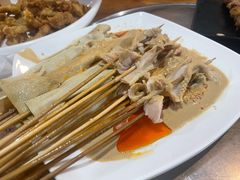 -明何记涮牛肚(品牌首店隋唐植物园南门古城路店)