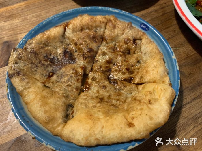 冯四孃跷脚牛肉·非物质文化遗产店红糖饼图片