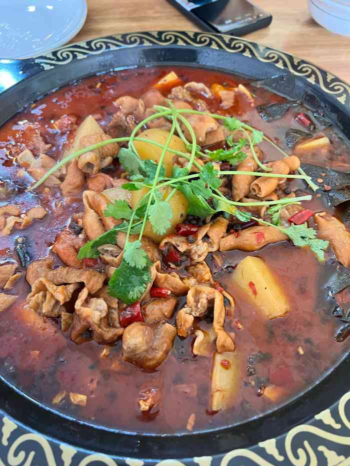 重庆火锅鸡豆花鱼(三桥店)-"万象城东门往里走50米 就能看见这个新店.