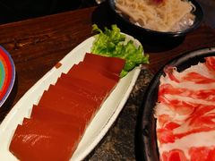 -老牌坊云南鱼豆花火锅(哈西万达店)