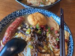 -明何记涮牛肚(品牌首店隋唐植物园南门古城路店)