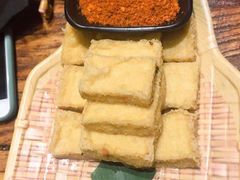 -老牌坊云南鱼豆花火锅(哈西万达店)