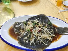 清蒸多宝鱼-1910老鲁味海鲜·戳子肉·青岛菜(金沙滩店)