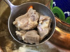 -毛辣果·贵州红酸汤牛肉火锅(西单店)